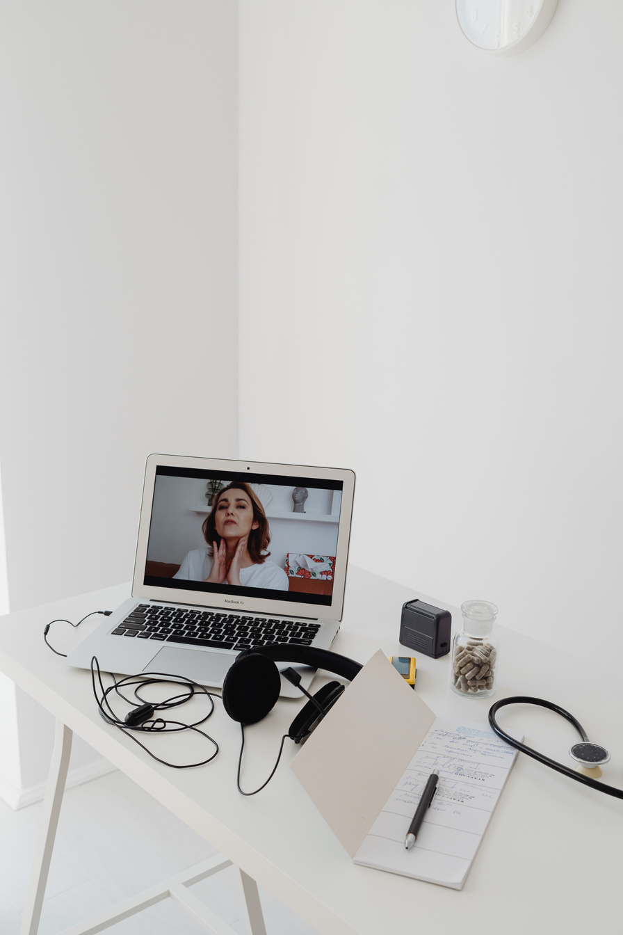 Woman on Laptop in Online Meeting